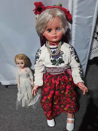 doll with Ukrainian beaded outfit. Plus other dolls, View more