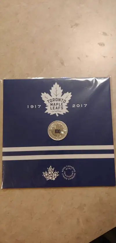 $3 fine silver coin. Commemorates the 100th anniversary of the Maple Leafs. New. Never opened.