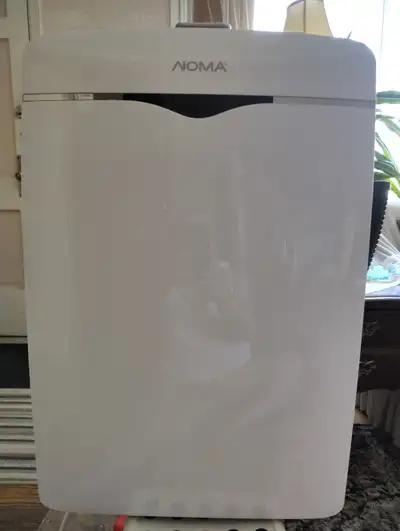 Air conditioner portable almost new 10 000 B T U on wheels, View more