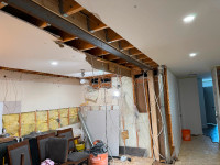 Walls removed open concept vaulted ceilings beams posts framing