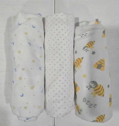 3 Receiving blankets. Bees, polka dots & moons & stars, View more