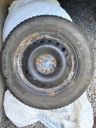 Set of 4 Mirage MR-W562 winter tires, sized 225/65R17, mounted on steel rims. These tires are in goo...