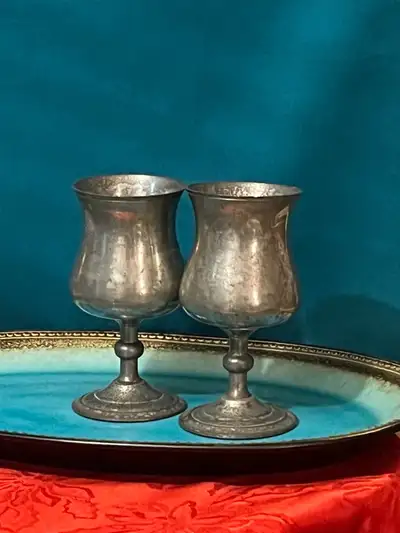 These are a pair of vintage English pewter goblets, each standing approximately 6 inches tall and be...