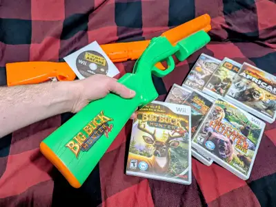 Nintendo Wii Accessories and Games .. Orange Shotgun +2 Games $35 (Top Shot Arcade and Big Hunter) ....