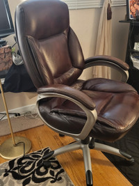 brown high back swivel office chair