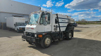 Parking lot and road sweeper