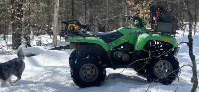 2006 Arctic cat 400 manual shift has wireless winch heated grips and comes with a plough $2500 Top e...