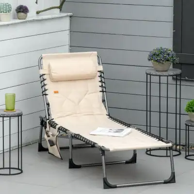 Relax in style with this nearly new beige lounge chair, perfect for your patio or garden. This comfo...