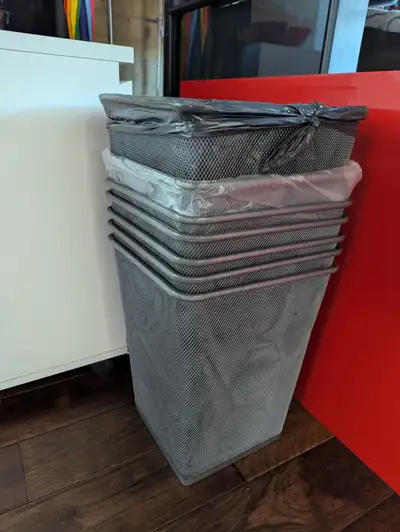 7 metal mesh garbage cans. 14" height, 10" width/depth. PU in Entertainment District. $50 for all.