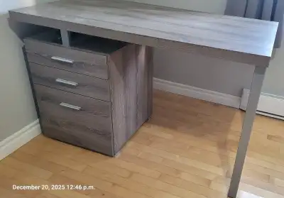 Grey Desk with 3 drawers. Very good condition, All drawers roll perfectly, One very small mark on to...