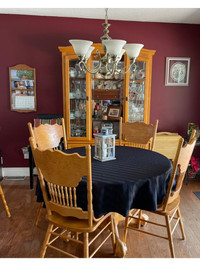 Dining room table ,5 chairs and hutch 