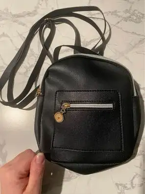 Small new purse.. never used.. ordered but it’s too small, View more