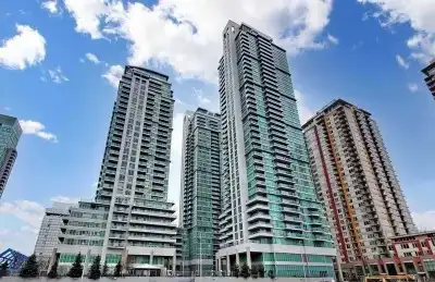 With walkout balcony, unobstructed south west view of CN Tower, Lake and sunset. Laminate floor in l...