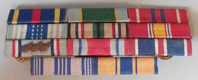 1) Air Force Training Ribbon 2) Small Arms Expert Marksmanship Ribbon 3) USAF NCO PME Graduate Ribbo...