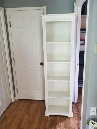 White bookcase, was originally used in baby room, but kids are grown up! In decent shape, a few plac...