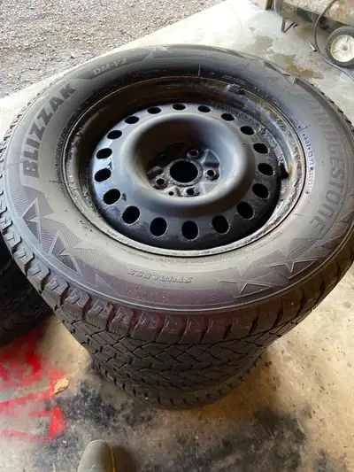 Set of four Bridgestone Blizzak Winter Tires with tons of tread left. Made in Jan 2018. Came off a T...