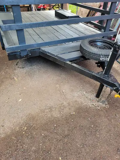 Flatdeck Utility Trailer. 106" by 76" deck size. Width between fenders is 47.5"". Can drive over fen...
