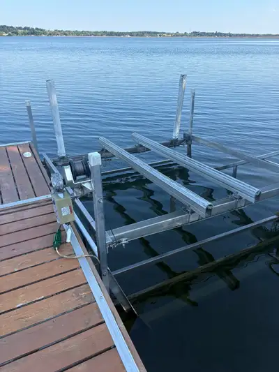 This 4000 lb pre-owned Lift Tech Marine boat lift is designed to provide secure and reliable lifting...