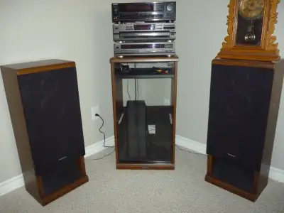 Steroe includes techniques 5 CD changer, equalizer, 100 watt amp, tuner, dual tape deck, 200 watt sp...