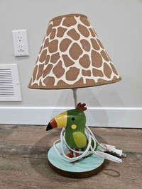 Bird status desk lamp.