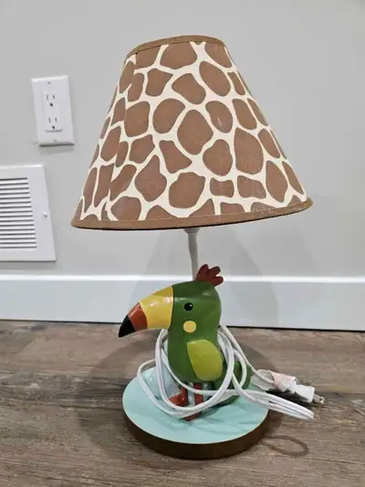 Bird status desk lamp., View more