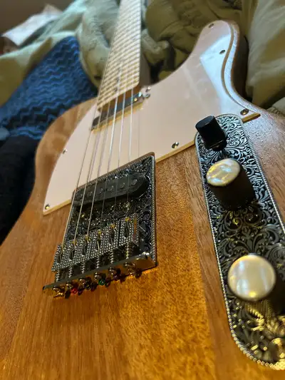 I made this guitar, it is very well put together and plays very nicely No brand markings Upgraded pi...