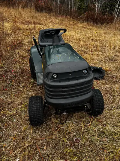 5 lawn tractors 4 need work. Used to run, 1 seized.