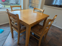 Table (with 2 pull out leaves) and 5 chairs.