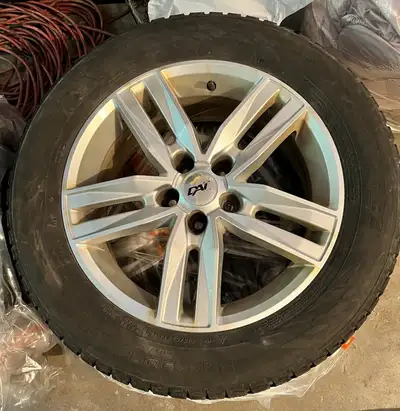 Used Nokian Snow Tires on Mag Rims for Ford Escape Titanium.
