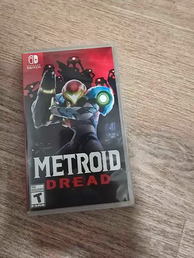 Vendre un jeu Nintendo Switch, Metroid Dread ! Ce jeu d'action-aventure est la cinquième entrée prin...