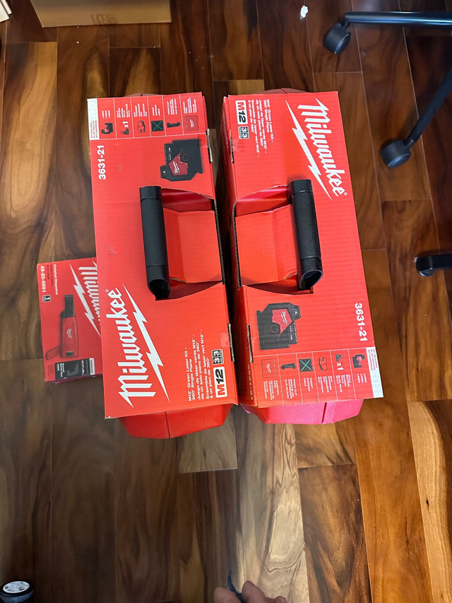 Milwaukee m12 laser level, drywall screw gun attachment in Hand Tools in La Ronge