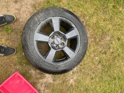 Tires on rims. Came off a gmc. 275/55/20s Tires are shot and rims are pretty beat up, one rim is cra...