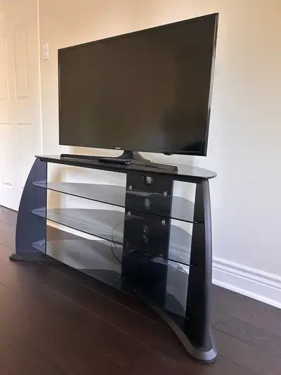 Like new flat screen 40” Samsung TV with remote and power cable. Without stand asking $100, with sta...