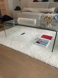 Glass sled coffee table