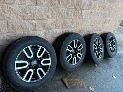 Bridgestone Duler A/T 275/60R20 winter tires with factory alloy rims