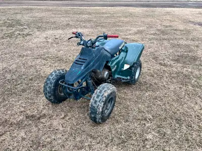 Suzuki 2x4 ATV / Quad. Tires in great shape and lots of life, plus spare set of tires on rims to go...