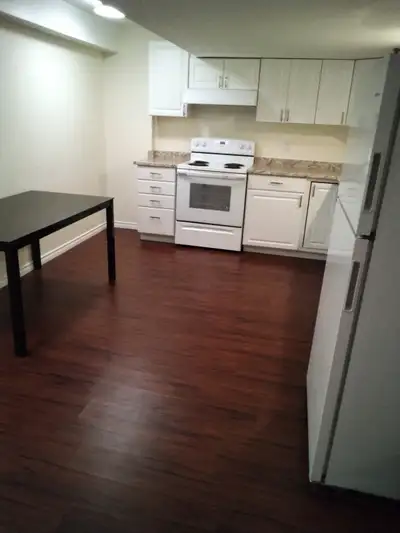 Two bedrooms basement apartment utilities included