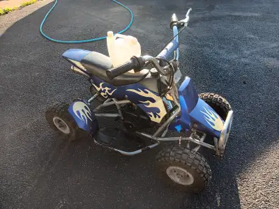 Small Kids ATV 2-Cycle, comes with easy-mix canister. Runs great. Located in Rice Point.