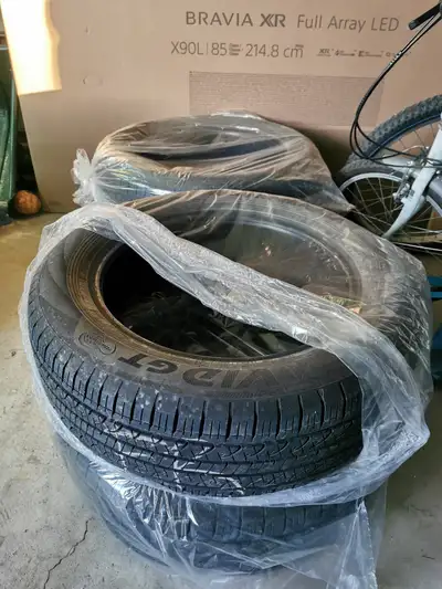 Set of 4 all season Yokohama tires; about 2 years old; size 225/60R18. $450 or best offer.