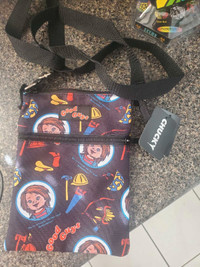 Chucky crossbody bag by the good guys. New with tags. $20.