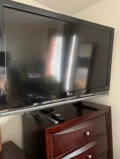 Sony Bravia 46" TV 1080P LCD with stand and remote, View more