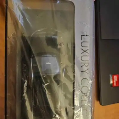 Brand new in sealed package Black 2012 Lincoln MKS resin diecast model car, by Luxury Collectibles....