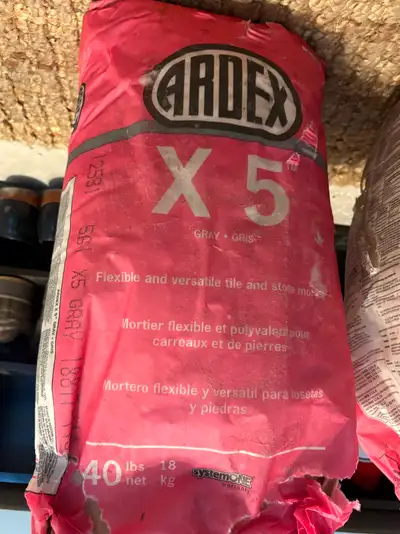 Free : 2 bags  tile and stone mortar. 18kg each, View more