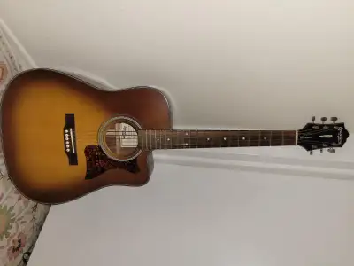 The Epiphone Masterbilt DR-400MCE VBS (Violinburst) is an all-solid wood acoustic-electric dreadnoug...