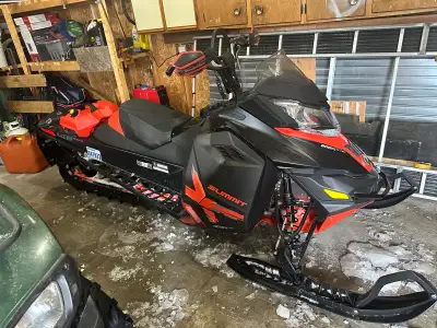 I'm selling my Ski-doo Summit X, a high-performance snowmobile that's ready to hit the trails or car...