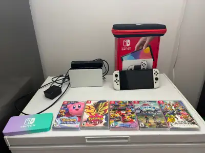 Nintendo Switch Bundle + 5 Games, Dock, Case & White Joy-Cons, View more
