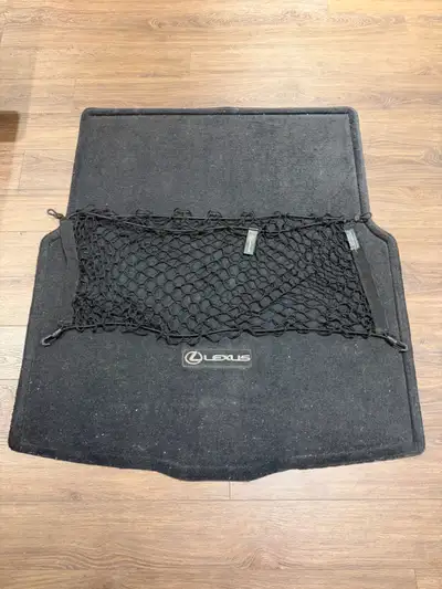 OEM Lexus IS trunk mat and trunk net for sale. Trunk mat/liner is carpet. Trunk net is mesh for hold...