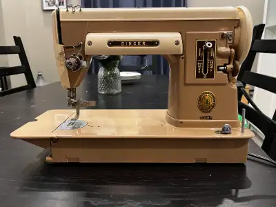 Selling a vintage Singer 301A sewing machine. This is a high-quality, all-metal machine known for it...