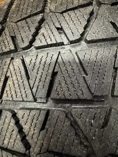 Four Blizzak 225/60 R17 tires on Subaru Crostek rims for $350. Sold car, so no longer needed.