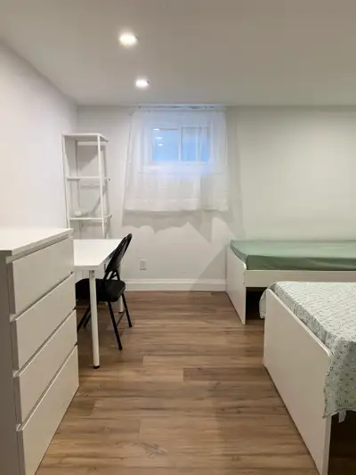 A two-bed bedroom in a female-only household. Near Kennedy Subway / GO Station. Utilities | AC | WiF...